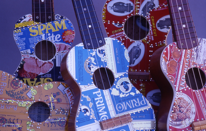Glass ukuleles with printed labels