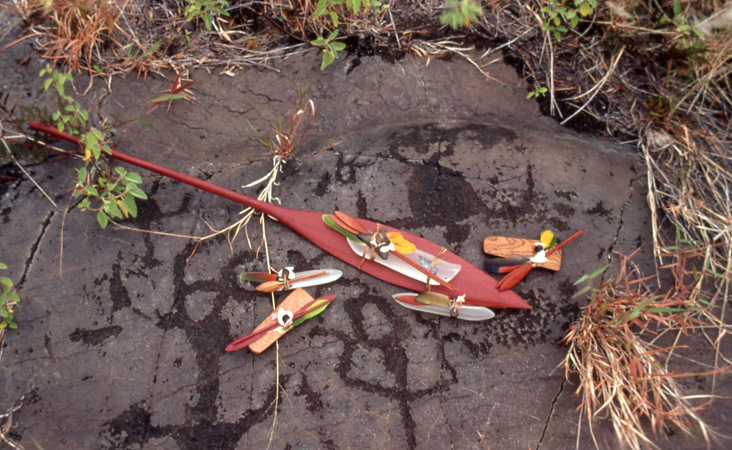 Fused glass sculpture arranged on a petroglyph site